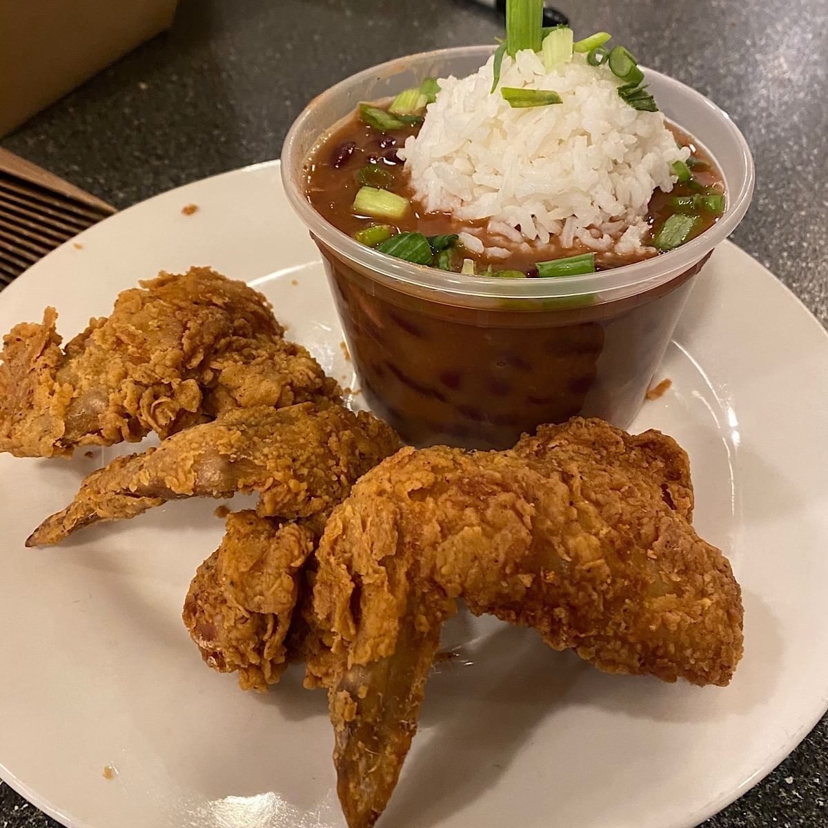 3 Wings and cup of Red Beans and Rice.
